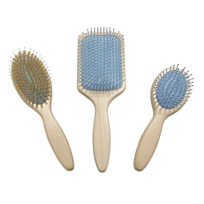Cepillo de pelo con paletas de madera de haya blanca con coj&iacute;n azul