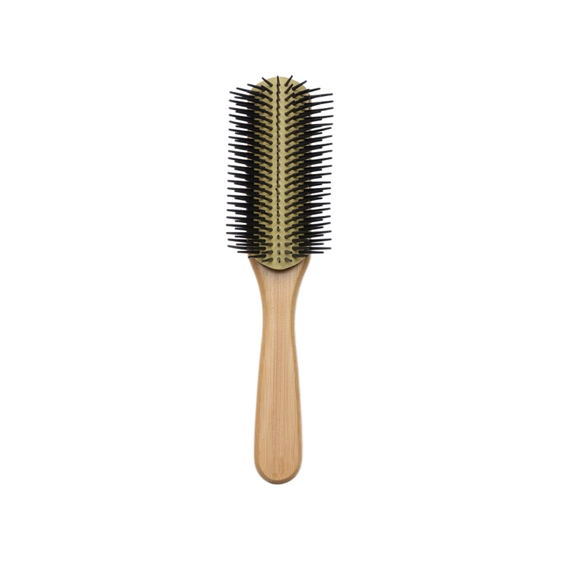 Cepillo de pelo de bamb&uacute; natural con coj&iacute;n desmontable.