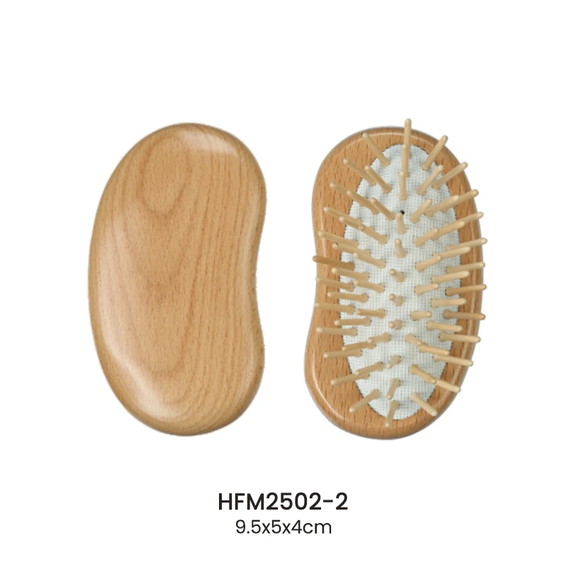 Cepillo de pelo con coj&iacute;n de madera de haya en forma de guisante y pasadores de madera