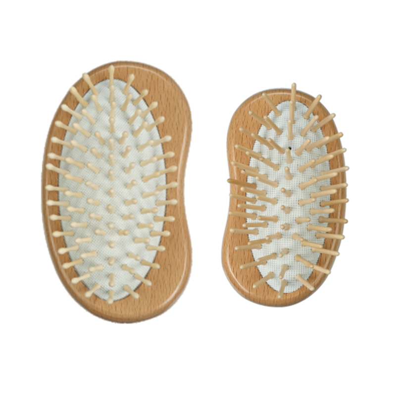 Cepillo de pelo con coj&iacute;n de madera de haya en forma de guisante y pasadores de madera