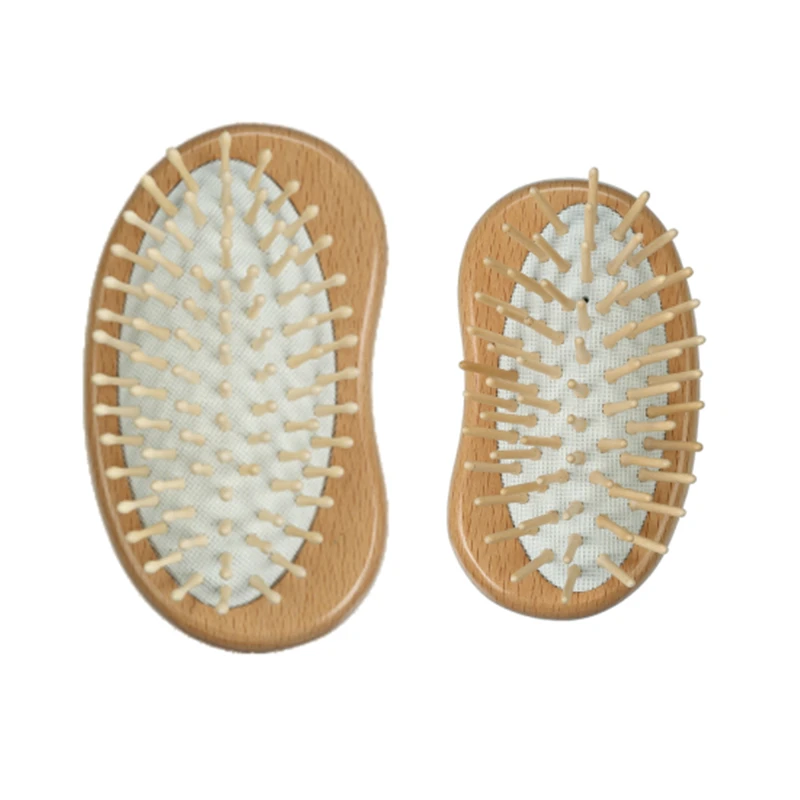 Cepillo de pelo con coj&iacute;n de madera de haya en forma de guisante y pasadores de madera