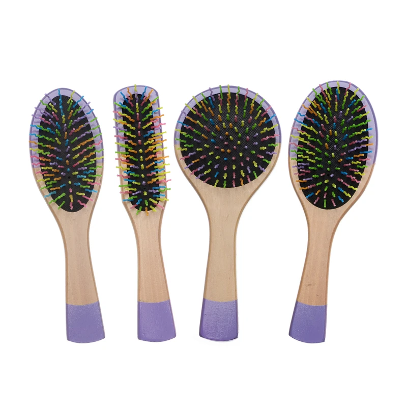 Cepillo para cojines de madera pintado de color p&uacute;rpura con alfileres de nailon de colores